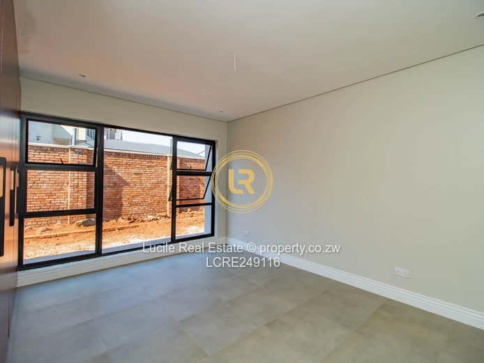 Elegant 4-Bedroom Residence with Premium Finishes in Quinnington