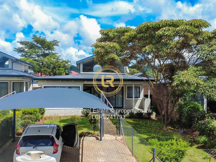 Seamless Living: A Cozy Indoor-Outdoor Retreat in Borrowdale